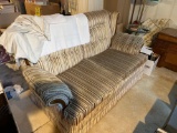 Couch with floor lamp