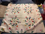 Large tulip quilt handmade by Mary Buchman