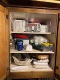 Contents of cabinet - blender, cups, cutting board, fridge organizers