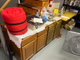 Wooden cabinets and contents - Rope, rags, sea shells, plungers, sleeping bag, table