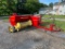 New Holland 315 square baler with belt thrower