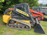 New Holland C238 skid loader with material bucket