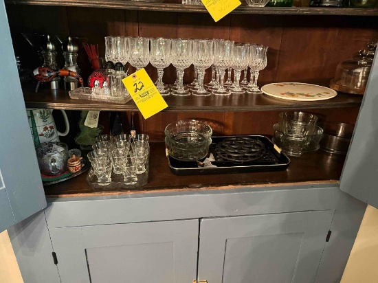 Set of crystal glasses, serving dishes, salt and pepper stackers, cast iron pieces