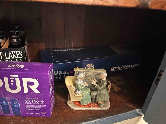 8 boxes of crystal glasses, water filters, and hummels