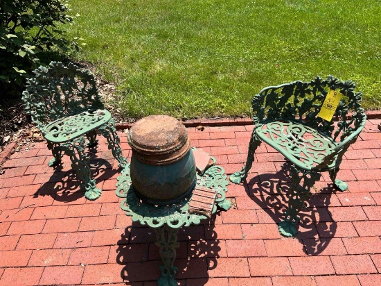 2 Cast iron grapevine chairs with a cast iron table - Plant pot not included
