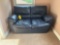 Two cushion leather love seat