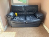 Two cushion leather love seat