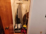 Contents of Closet - Sweepers, Ironing Board, Wood Round Folding Table