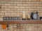 Clock, candles, sign