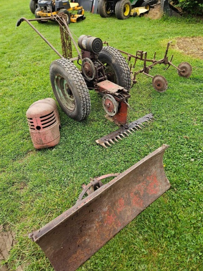 David Bradley tractor frame with cutterbar, blade, and cultivators
