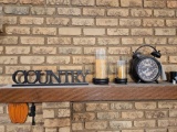 Clock, candles, sign