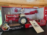 Ertl big farm farmall 1206 with attachments