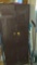 2 door metal storage cabinet with contents