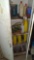 Metal cabinet in garage with contents
