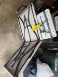 Two folding plastic tables