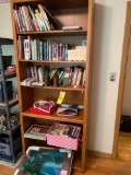 Shelf and contents - books - lighted picture - calligraphy set