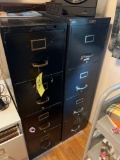 2 four drawer metal file cabinets