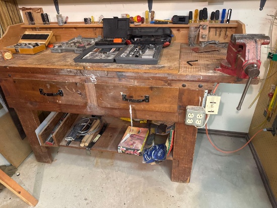 workbench with Colombian vice, Forstner bits, and assorted tools