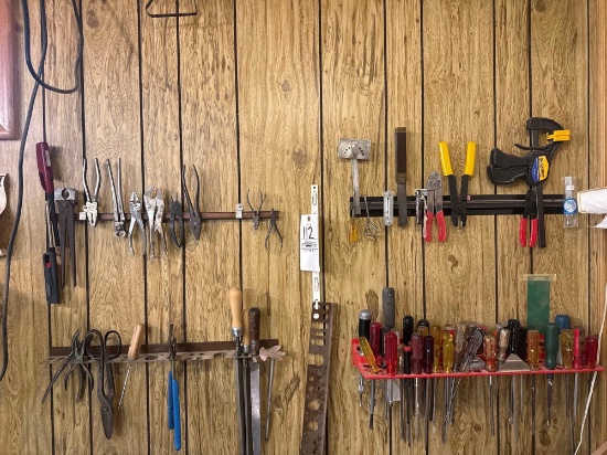 hand tools on tool room wall
