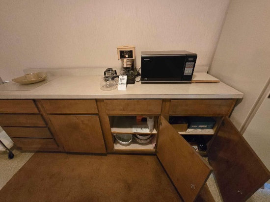 Contents of Cabinets inc.Panasonic Microwave, Bunn Coffee Maker, Table Cloths, Servingware