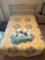 3 quilts, 2 blankets, ironing board, shelf divider, neck pillow