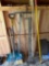 Assorted tools, snow shovel, brooms, hard rakes, level, branch trimmer