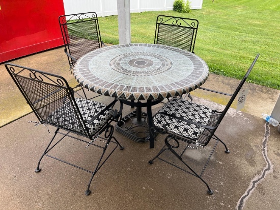 wrought iron patio table, 4 chairs, umbrella
