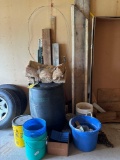 grouping of buckets, nails, barrel, fence post, wood,