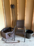 patio chair, deer head fire place, planting pot, crowbar, 2 tiki torches