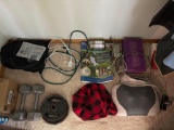 Contents of closet, weights, massager, assorted tops, jackets, belts