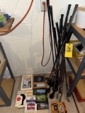 Large assortment of golf clubs, tees, balls, books!