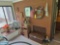 Enclosed Patio Corner Contents - Wind Machine Fan, Cooler, Stand, Small Decor, & Wall Art