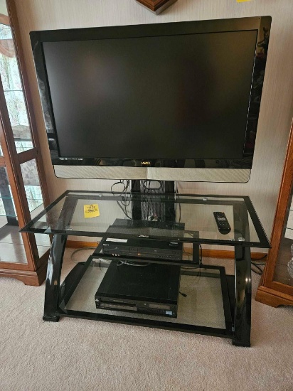 42 In. Vizio TV, Sony DVD/VHS Player, HQ DVD/VHS Player, & Z-Line Entertainment Stand