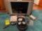bose quiet comfort 15 headphones, tomtom, apple charger, sharp aquos tv with remote