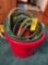 large red tub and garden hose