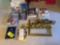 assorted books including motorcycle, wood working, self help books, frame piece, wlephant walldecor