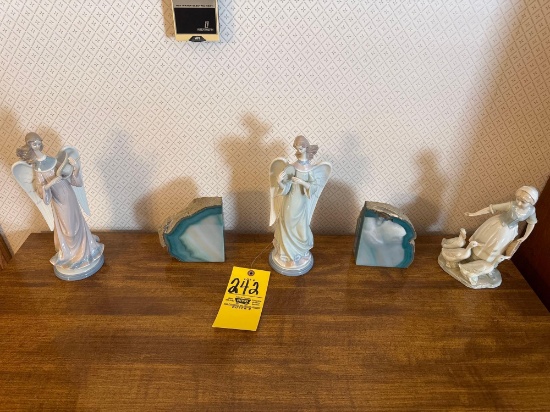 two lladro lady figurines, lady and duck figurines, stone decor