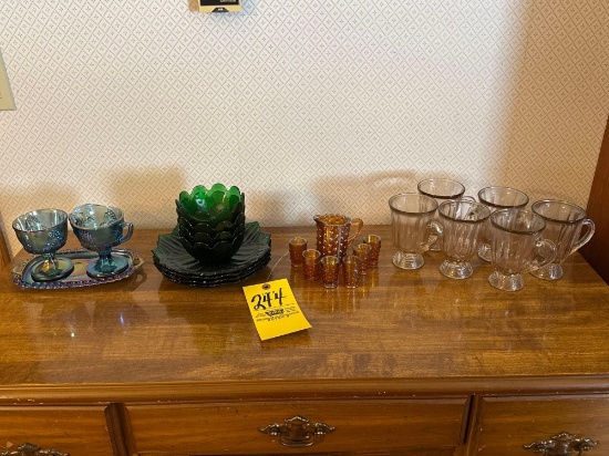 assorted colored depression glassware