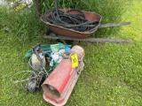 portable heater - old wheel barrow - sprayer - cable