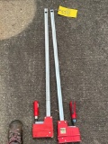 pair of Bessey clamps