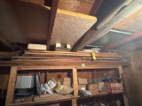 Cherry lumber on top shelf
