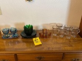 assorted colored depression glassware