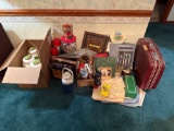 household lot includes canister set, thermoss, holiday tins, perfumes, place settings, candles,