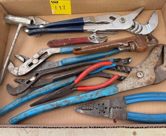 Collection of pliers and wrenches