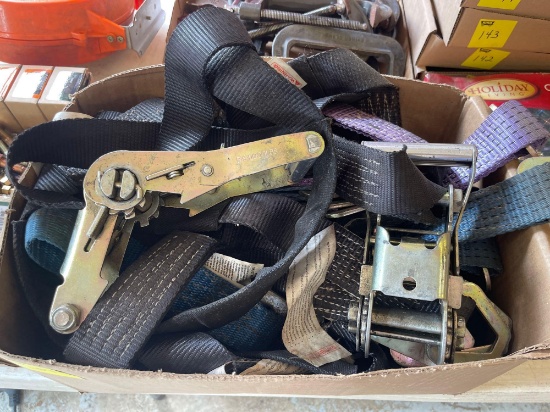 box of tie down ratchets straps