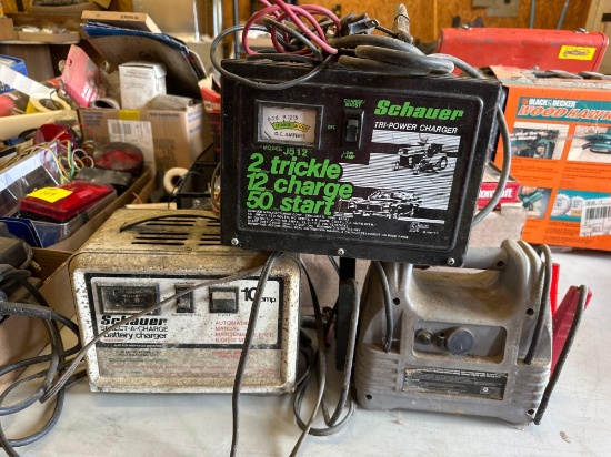 three battery chargers