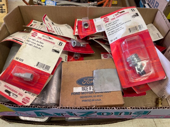 assorted tire hardware and Ford latch