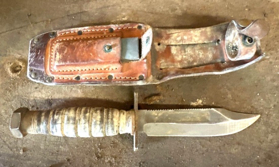 leather case, sharpening stone, and cutter