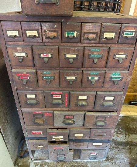 antique oak cabinet with multiple drawers