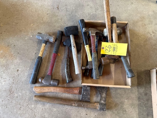 Box of hammers, hatchets, and a tomahawk